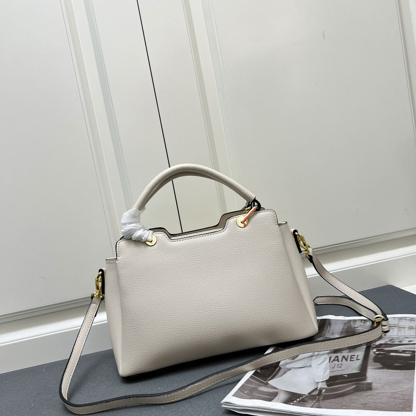 Pra*a top handle bags